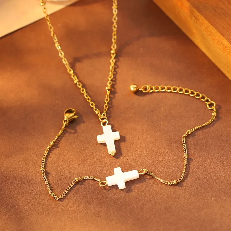 Set Cadena +Pulsera
(Cruz Blanco/Dorado)